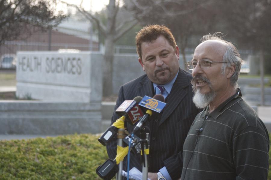 Brad Lopez and his lawyer Charles Magill giving a statement for the media in front of the Health Sciences building.