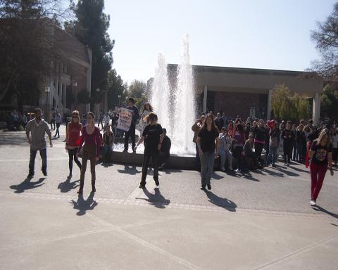 Photo by Karen West. Students broke out in a flash mob to protest violence against women as a part of the "One Billion Rising" movement on Feb. 14.