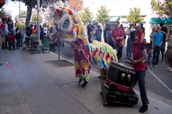 John Chos Lion Dancing Team preparing to cleanse and promote good fortune for the Takshing Herbs Center in part of the Chinese New Year Festival March 2. (Photo/Karen West)