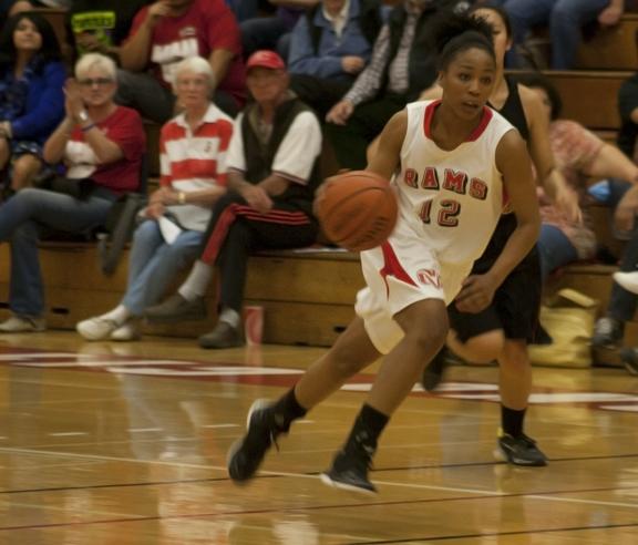 Rams Jazmine Simpson charges down the court while playing against De Anza College March 2. (Photo/Victor Aparicio.)