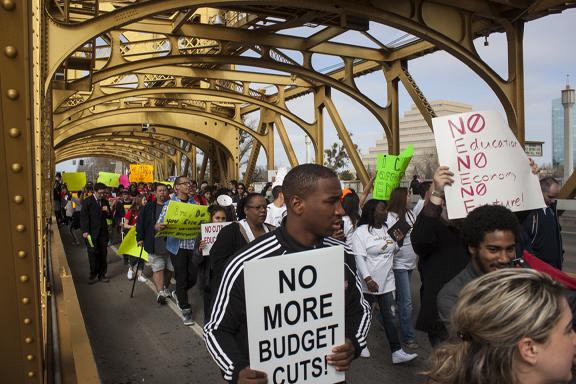 Thousands marched to the State capitol in Sacramento to protest the budget cuts to education. (Photo/Darlene Wendels)