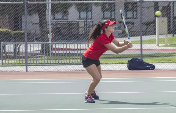 Photo By Kevynn Gomez. Lenora Pate in the Doubles Conference against Sacramento City College on March 15.