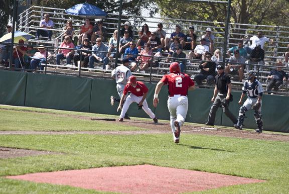 Photo by Karen West. Fresno City College Rams Anthony Hawkins steals home during Saturday, March 16, 2013 baseball game against the Sequoias Giants.