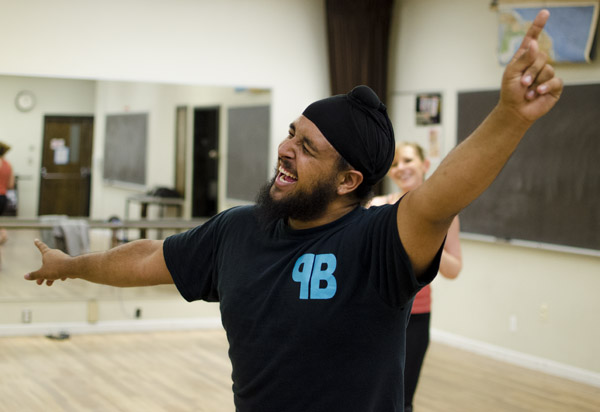 Preet Grewal teaches Fresno City College Students forms of Punjabi folk dancing at the Asian Dance Work shops in the Fresno City Colleges theater room, Monday, April 22, 2013. (Photo/Michael Monroy)