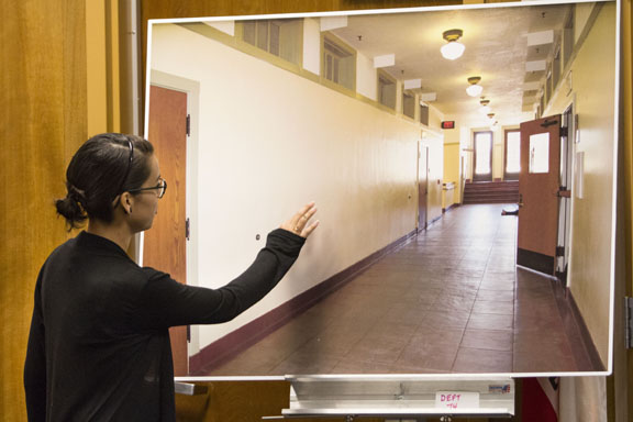 Fresno City College student Kevynn Gomez pointing out a location of her alleged assault on an enlarged image for the jury of the courtroom on Wednesday Oct.9,2013. Gomez was allegedly assaulted by former FCC instructor Brian Calhoun on March, 22, 2013 in the upper west wing in front of Old Administration Building room 216