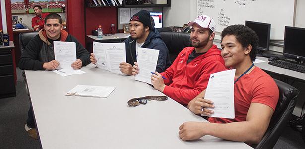 Touchdown: FCC football players sign to big universities