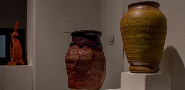 Ceramic stoneware by Fresno City College art student Gabriel Mendoza, titled “Red Drip” and “Yellow Crag,” are displayed at the spring 2014 Student Art Show in the Art Space Gallery on Tuesday, April 29, 2014. Mendoza was the recipient of the ClayMix award, which provides a chosen student with a gift certificate for art supplies. Photo/Kevynn Gomez