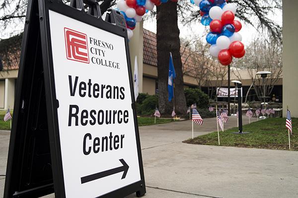 A sign points toward the Veteran's Resource Center at Fresno City College.