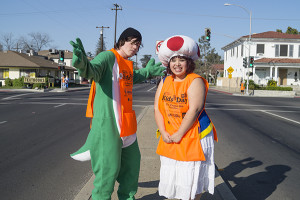 Game Club member Chrytian Major stands with another club member in the middle of McKinley Avenue for Kids Day 2015. Photo/Ramuel "Ram" Reyes.