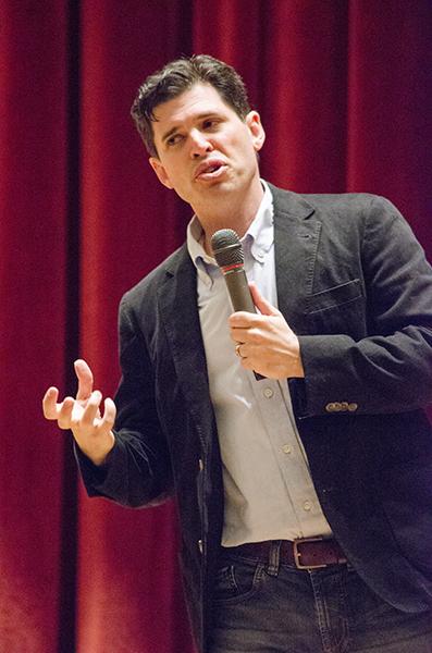 Max Brooks, zombie lore expert and best selling author, speaks at Fresno City College Tuesday, April 14, 2015. Brooks explains his own experiences with writing books about a zombie apocalypse.