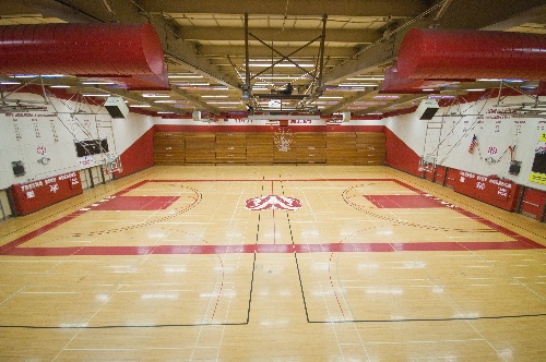 The Fresno City College basketball courts sit empty. 