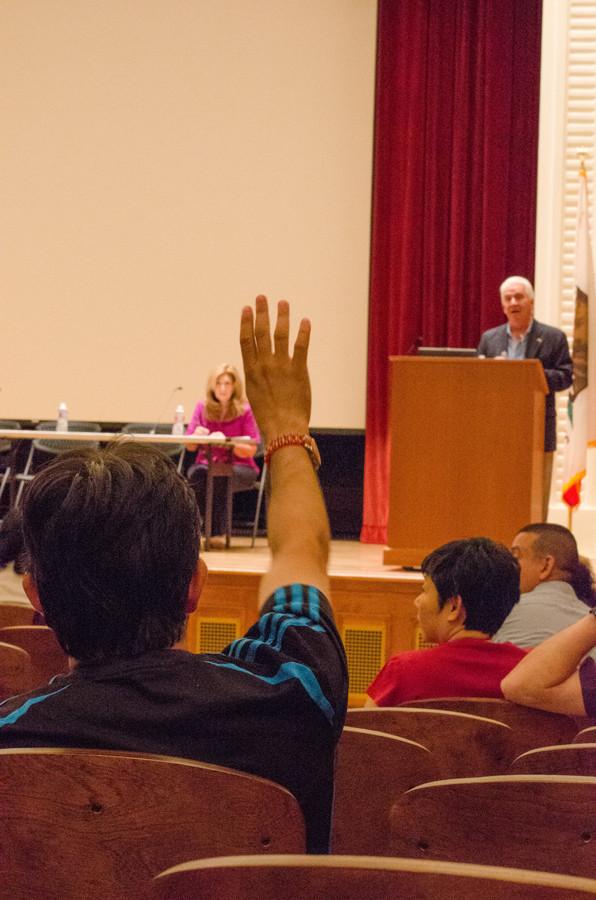 Members of the audience ask questions of Congressman Jim Costa in relation to the immigration system. Saturday, Aug. 22, 2015. 