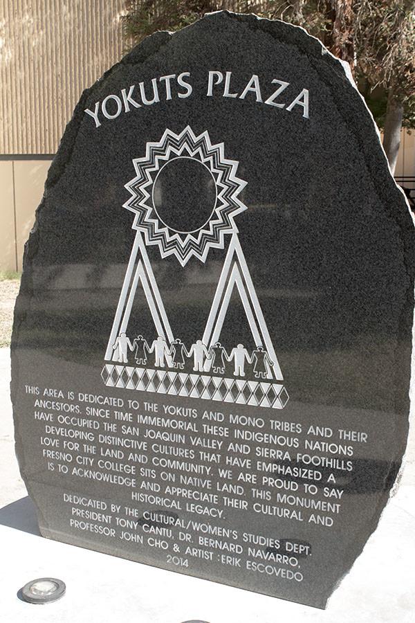 The+Native+American+stature+honoring+the+Yokut+Tribe+stands+in+a+busy+walkway+on+campus.+Native+American+Day+is+Sept.+24%2C+2015.+