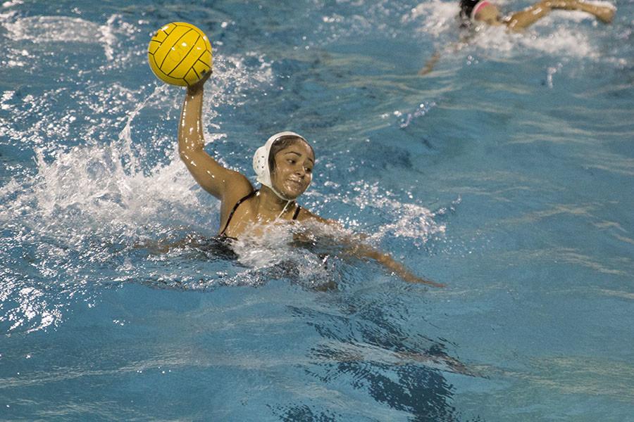 Fresno City College Water Polo team captain, Sophomore Saylene Servin, fires at the goal in practice, at Fresno High School Oct. 30, 2015.  