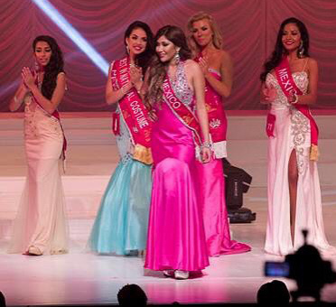 Vianey Cobian, Rampage reporter, stands on stage at the Miss Latina Global beauty pageant in Redondo Beach, CA on Nov. 22, 2015.