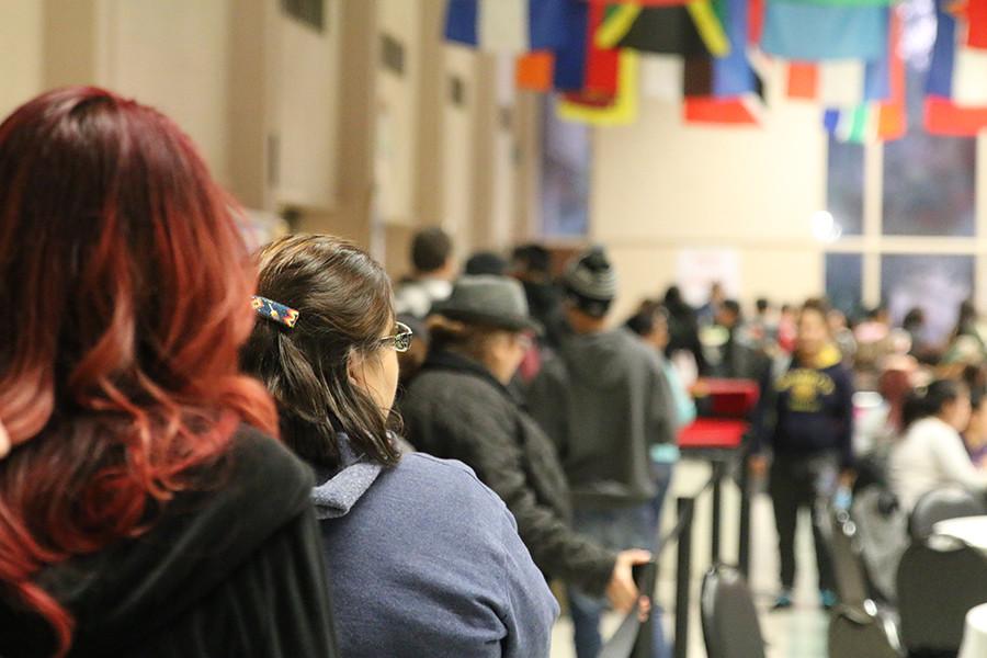 Students line up outside the cafeteria to receive a meal. Wednesday, Dec. 3, 2015. 