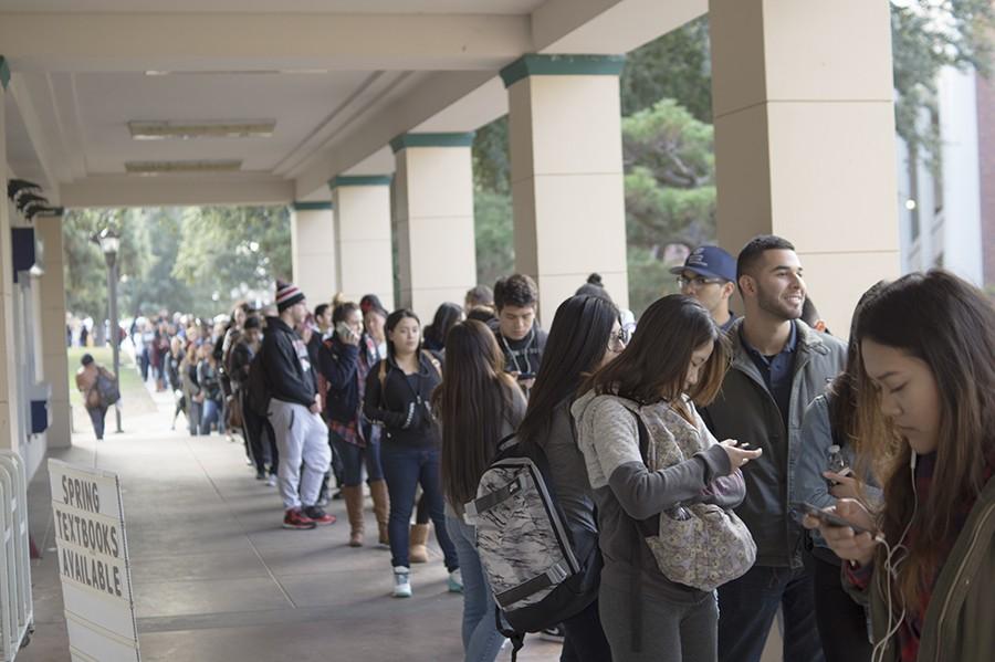 An extremely long line of student waiting outside of the FCC bookstore on Wednesday, Jan. 13, 2016.  Archive photo