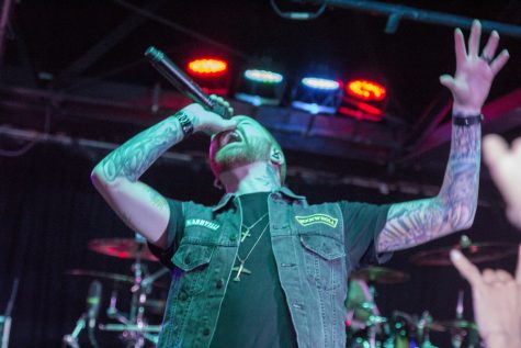 Memphis May Fire vocalist Matty Mullins hypes up the crowd at Strummer's in Fresno, Calif. on May 12, 2016.