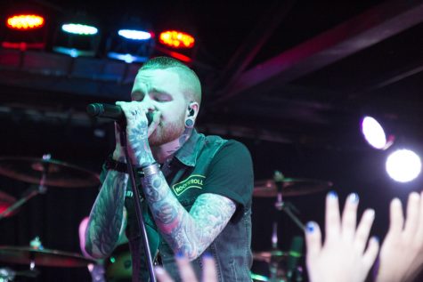 Memphis May Fire vocalist Matty Mullins sings at Strummer's during the Bands VS. Food Tour in Fresno, Calif. on May 12, 2016.