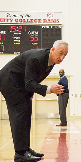 Rams Head Coah Ed Madec coaches the mens basketball team during their game against Contra Costa College as the rival team coach looks over on Saturday, March 5, 2016. The Rams won 100-89 and are moving forward to the state final four. 