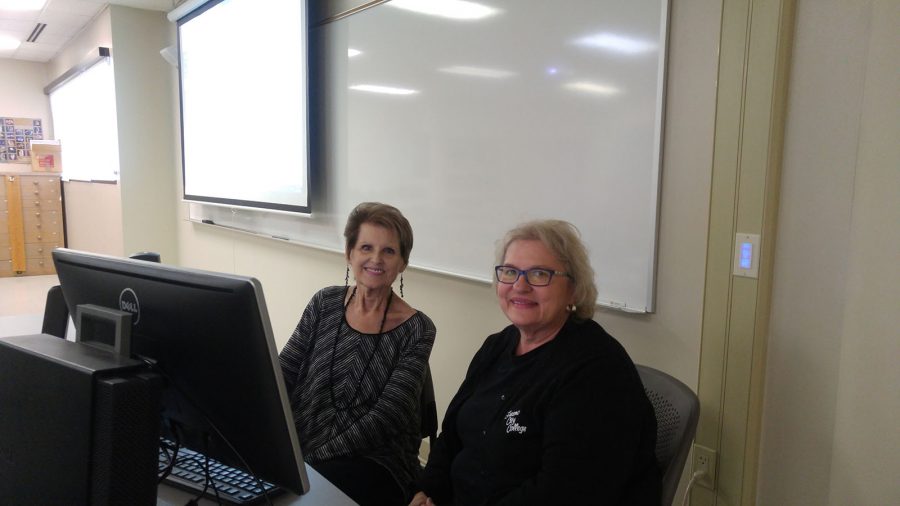 Fresno City College instructors Sheila Martin and Linda Vang attend a Canvas workshop at the Clovis Community College Herndon Campus on Oct. 22, 2016.