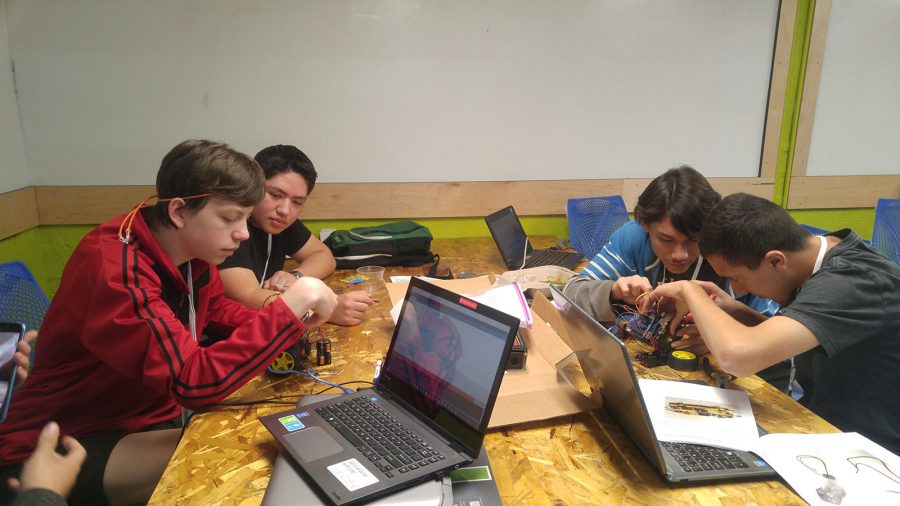 High school students build a robot during DevFest 2016 at Bitwise South Stadium in downtown Fresno on Oct. 22, 2016.