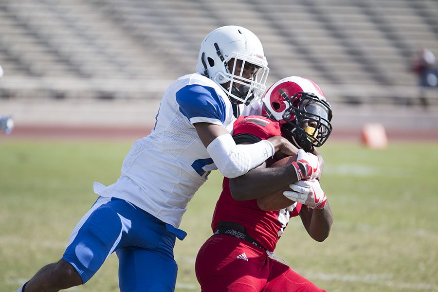 Rams running back Nate Jones breaks a tough run in his teams tough loss to Modesto Junior College during homecoming game.