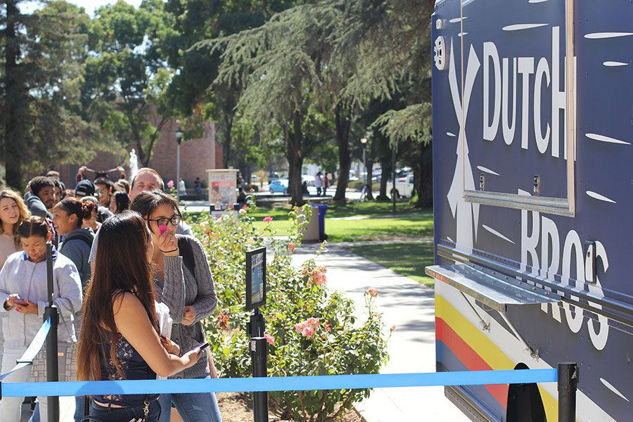 Students wait in line for free Dutch Bros by the Old Administration Building on Oct. 4, 2016. 