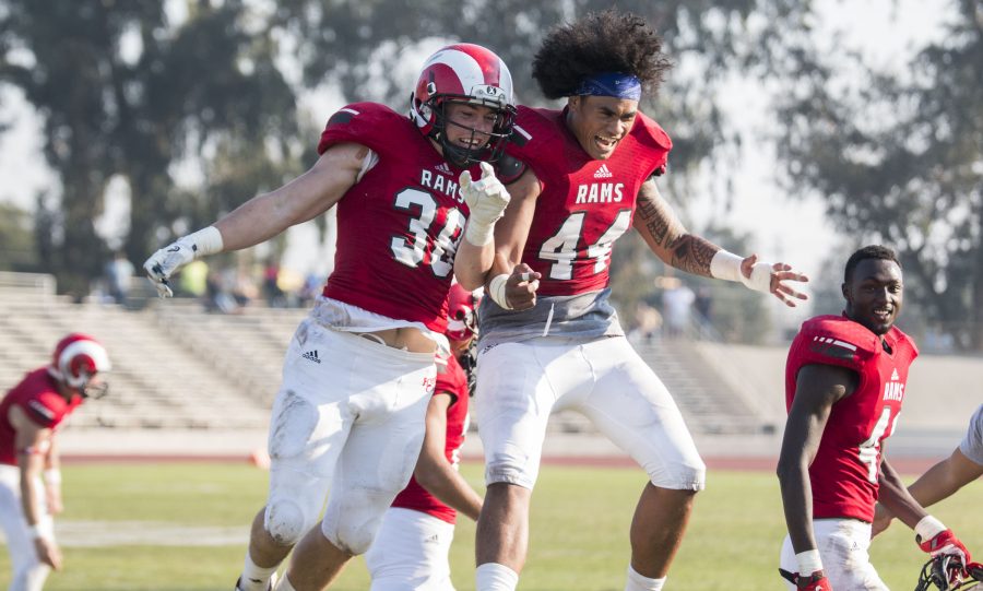 Thomas Lopez and Hugo Mendez celebrating after the Rams successfully blocked a punt against the San Joaquin Deltas at Ratcliffe Stadium on Nov. 5, 2016. The Rams won against the Deltas, 45-43. Photo/Ram Reyes