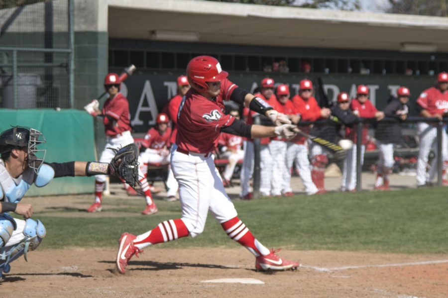 RJ Hartmann hits the ball against Cabrillo College during their game on Saturday, Feb. 25, 2017. The Rams won 2-0. Photo/Ram Reyes