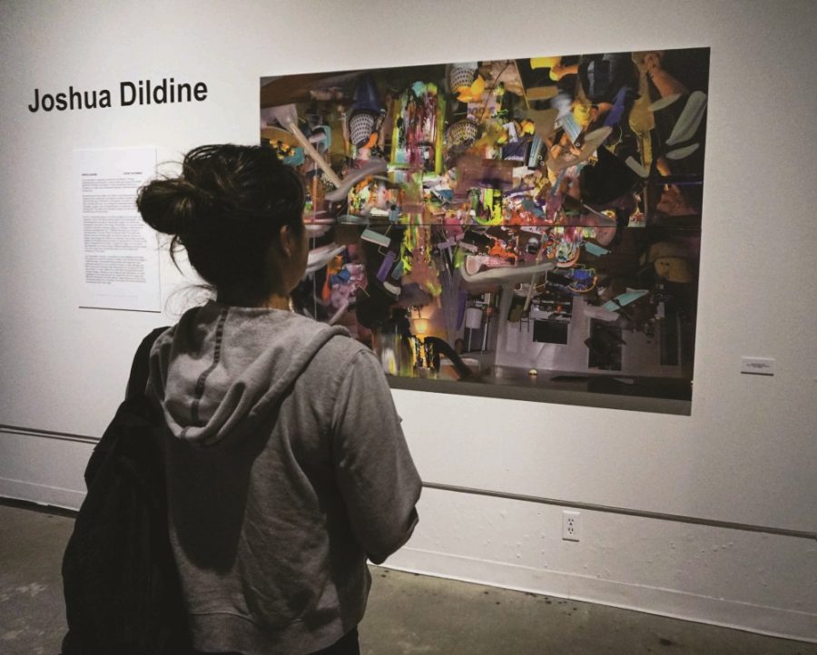 Student Elsa Solano ponders the meaning of the art piece, Vocal Arm Iron, in the FCC Art Space Gallery on Thursday, Feb. 2, 2017. Photo/Cheyenne Tex