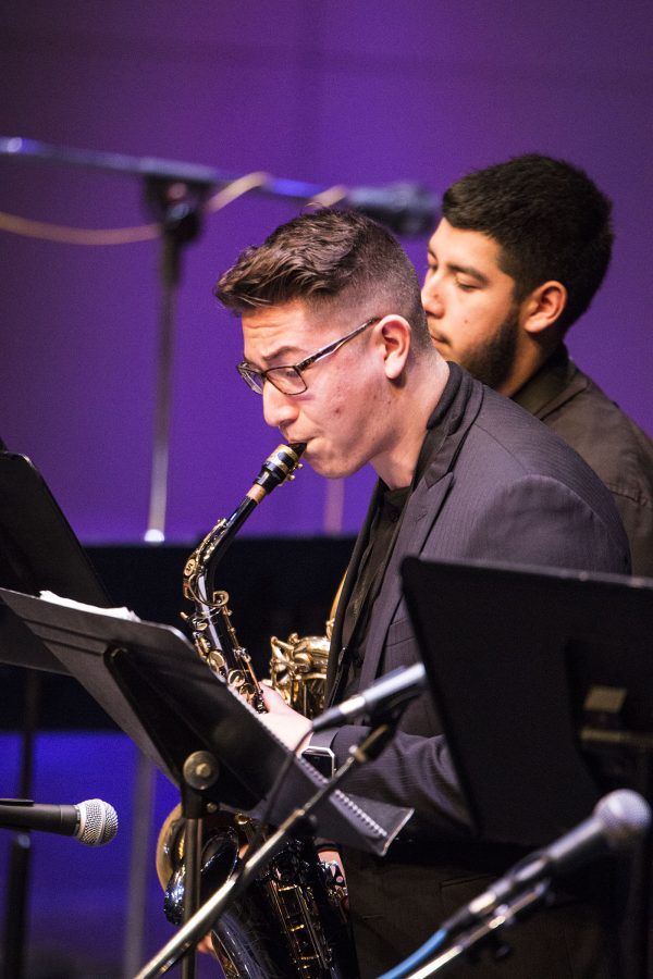 Chris Estrada performing a saxophone solo in the FCC Combos in the Fresno City College Theatre on March 14, 2017. Photo/ Larry Valenzuela