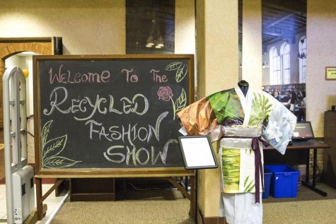 A sign welcomes guests to the Recycled Fashion Show in the FCC Library as a part of Asian Fest on April 28, 2017.