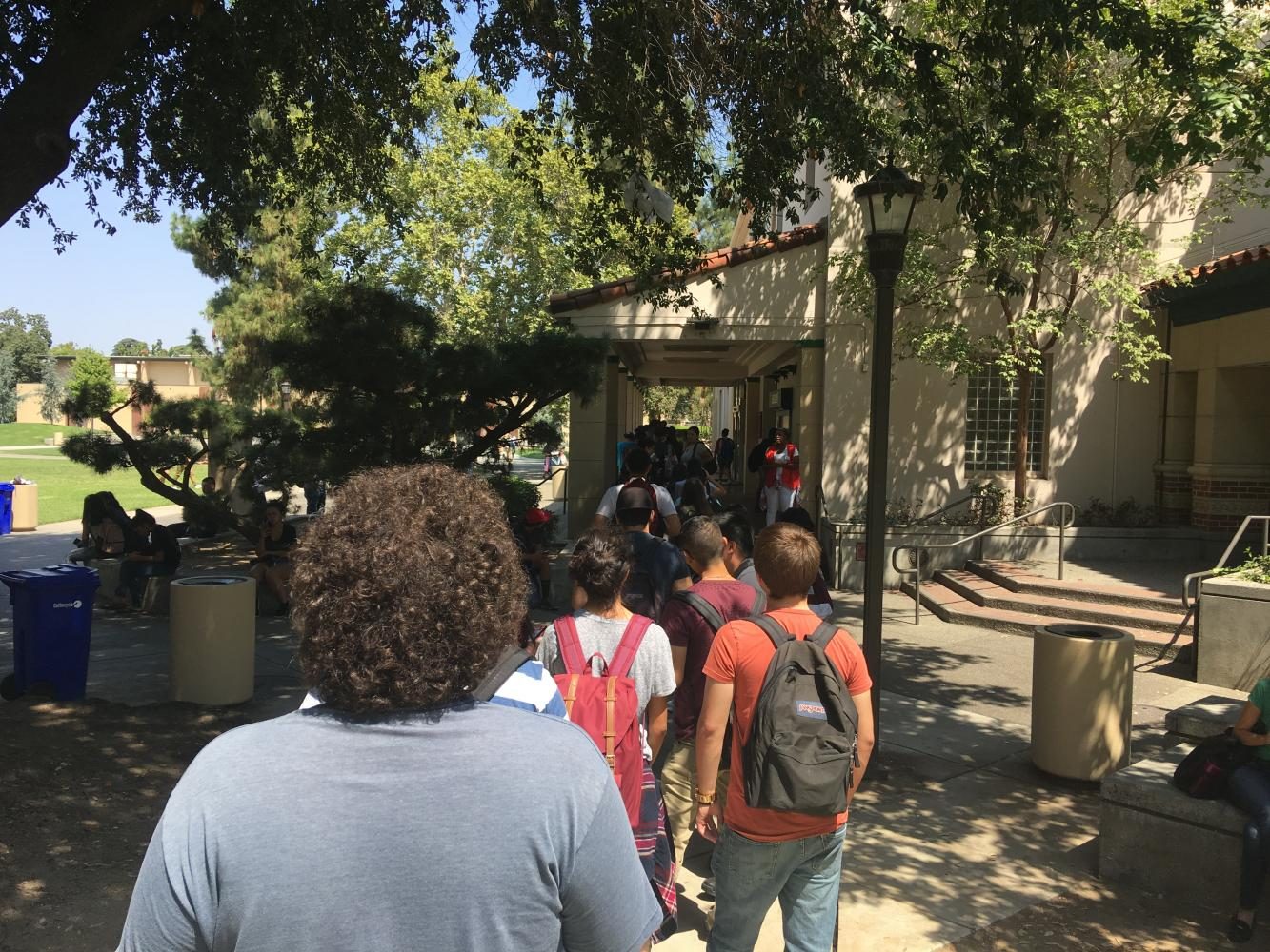 Fresno City College students wait in line to get in the bookstore on Tuesday, Aug. 15, 2017