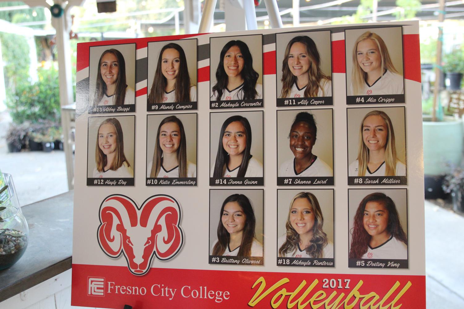 Portrait of the FCC Volleyball team during a fundraiser at the Gazebo Gardens.