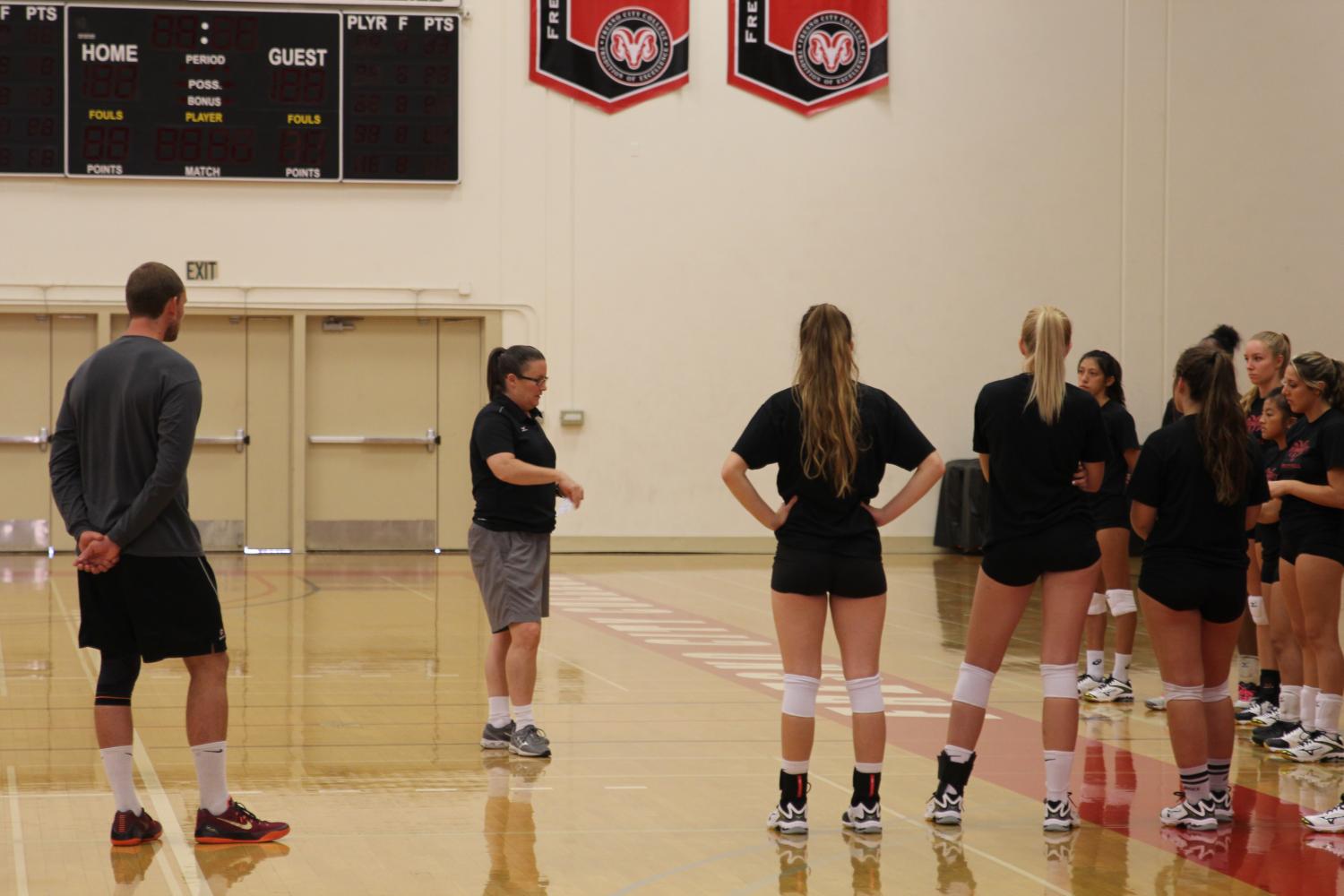 Coach Roblee speaking to the team before the start of practice