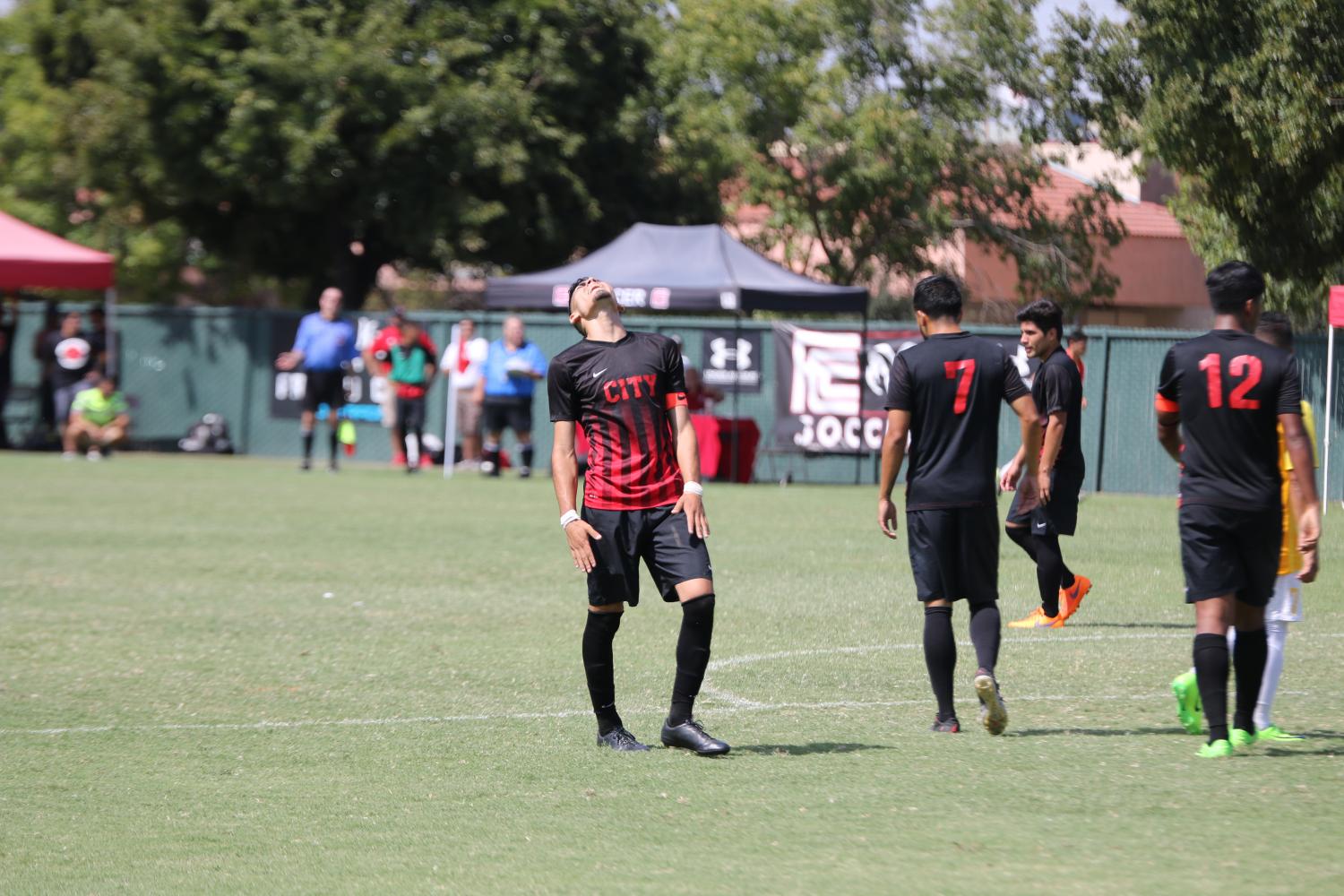 Rams mens soccer players show their frustration after not being able to keep the lead during a tied game against Cañada College at home on Saturday, Sept. 16, 2017.