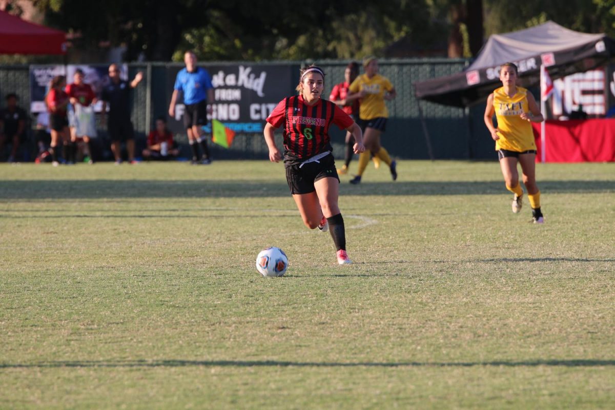 Fresno City College center Consuelo Luna passes the ball during a home game against Taft College on Tuesday, Sept. 26, 2017.