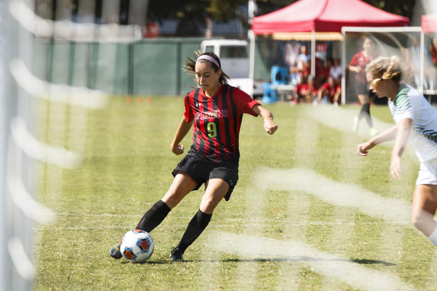 Rams Womens Soccer Forward Raina Wristen takes a shot at the goal against Evergreen Valley College on Saturday, Sept. 16, 2017. 