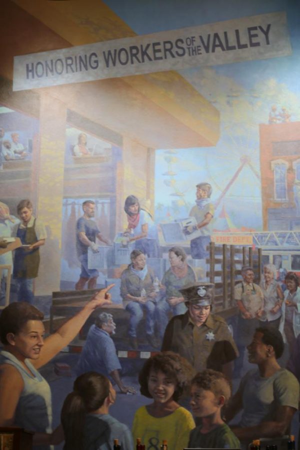 Honoring Workers of the Valley, a mural painted by FCC instructors and students, is on the second floor of The Big Fresno Fair museum.