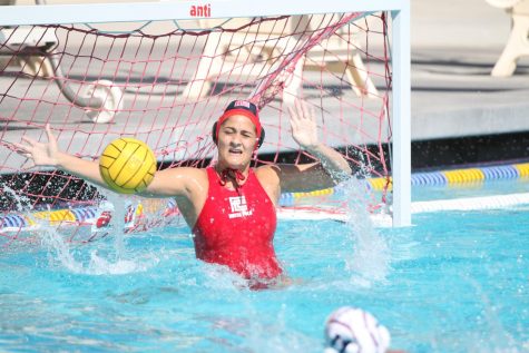 Fresno City College goalie Candice Islas stops a shoot on goal from an American River College player at home on Thursday Sept. 29, 2017