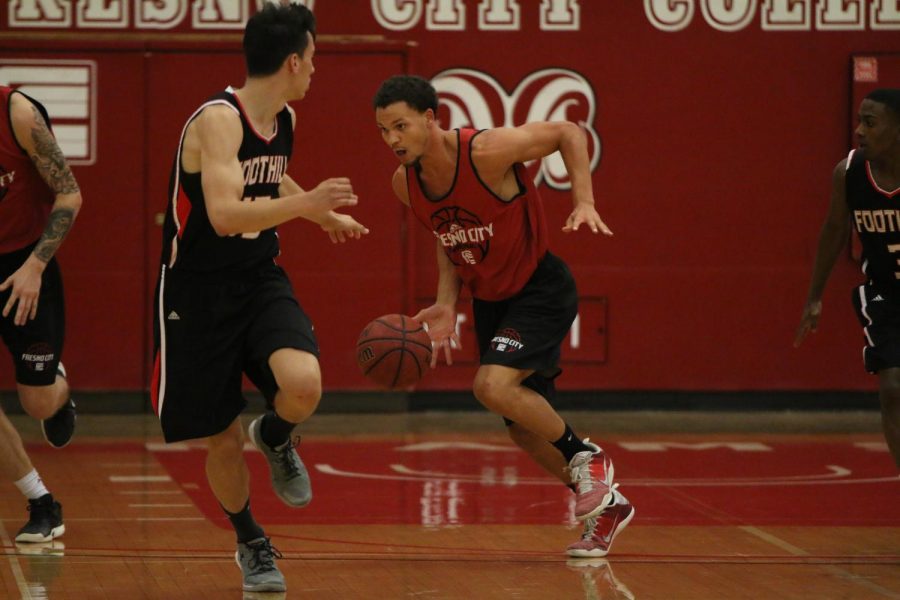 Fresno City College basketball player takes advantage of a fast brake during an exhibition game at home against Foothill College on Thursday, Sept. 28, 2017.