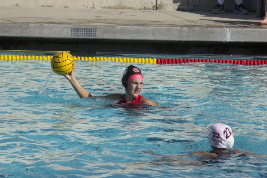 Fresno City College attacker McKenna Davis prepares a pass during a match against Sierra College at Fresno High School on Thursday, Oct. 19, 2017.