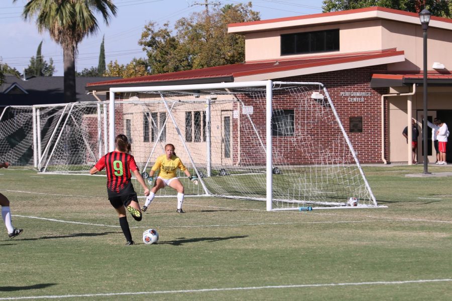 Fresno City College forward Raina Wristen takes a shot on goal during a home match against Bakersfield College on Tuesday Oct. 3, 2017.