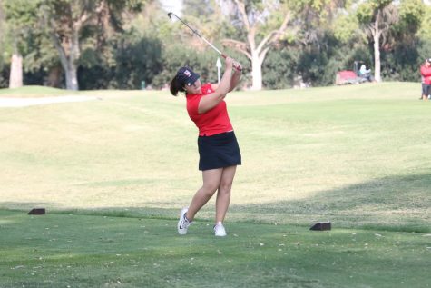 Fresno City College golfer Katelin Eickholt drives the ball off the tee during a tournament held at Sunnyside Country Club on Thursday, Oct. 12, 2017.