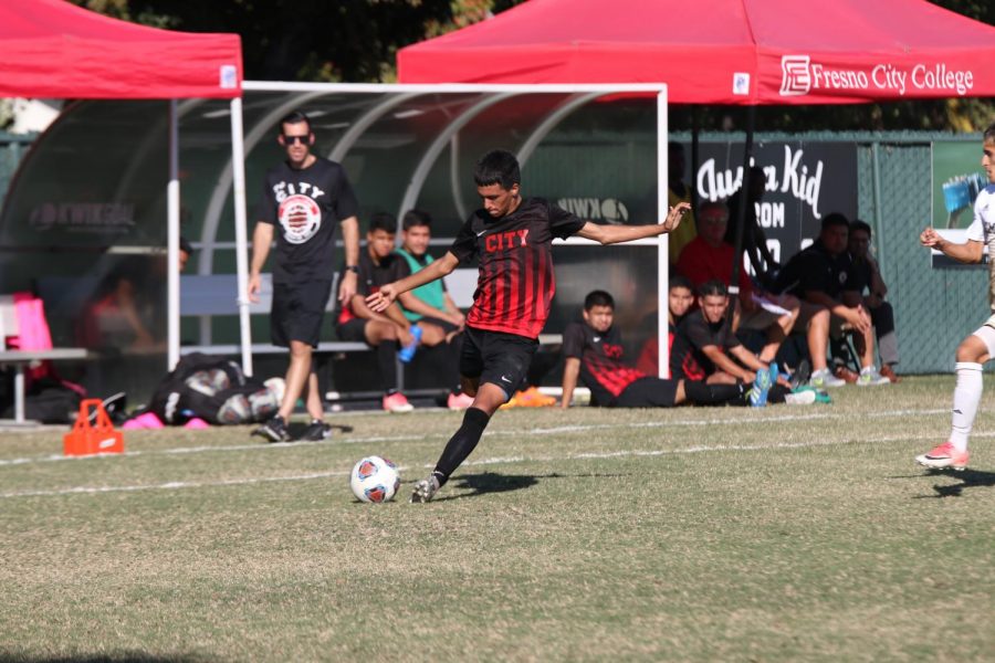 Fresno City College defender Esteban Rangel passes the ball during a home match against West Hills College Lemoore on Tuesday, Oct. 24, 2017.