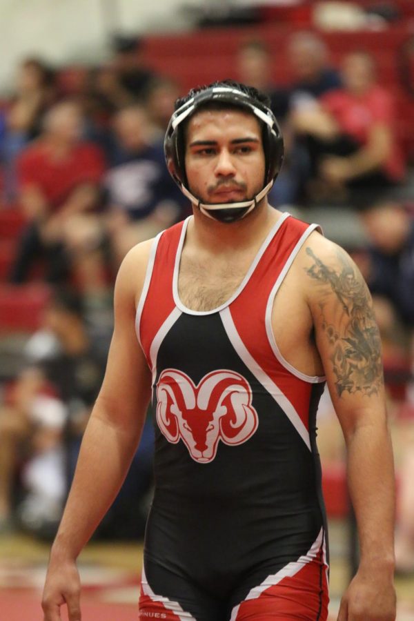 Fresno City College wrestler Miguel Ruiz Jr. steps into the mat during the Bill Musick Open tournament on Saturday, Nov. 4, 2017.