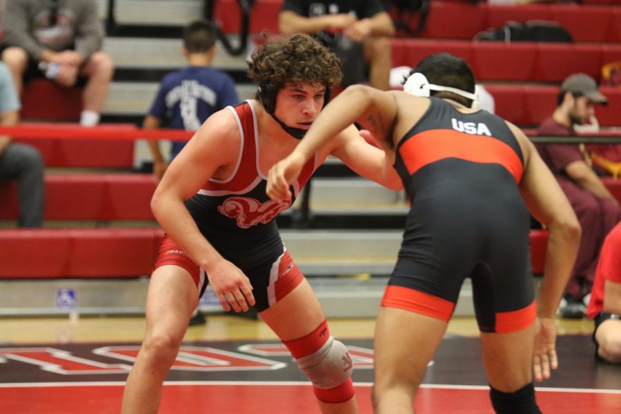 Fresno City College 149 pounder Dylan Martinez stares down his opponent during the Bill Musick Open Tournament on Saturday, Nov. 4, 2017. 