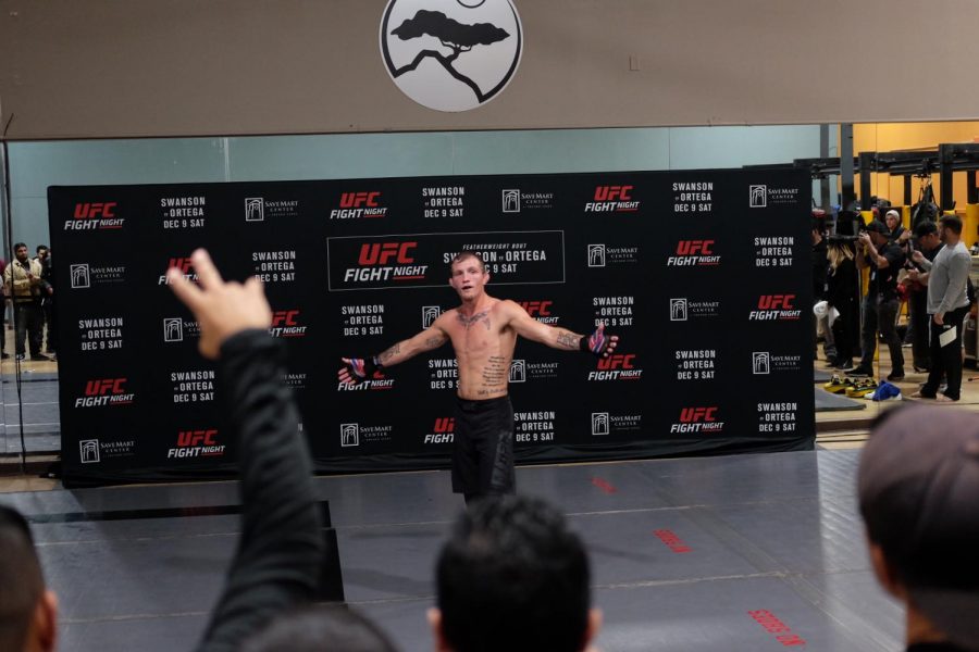 UFC Featherweight Jason The Kid Knight greets the crowd during the UFCs open workout for UFC Fresno on Thursday Dec. 7 at Fitness Evolution on First and Herndon.