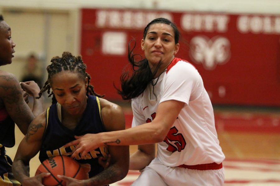 Fresno City College womens basketball guard Jasmine Phoolka gets the ball stolen from her by a Merced College player during the Fresno City Tournament championship game on Sunday, Dec. 10, 2017.